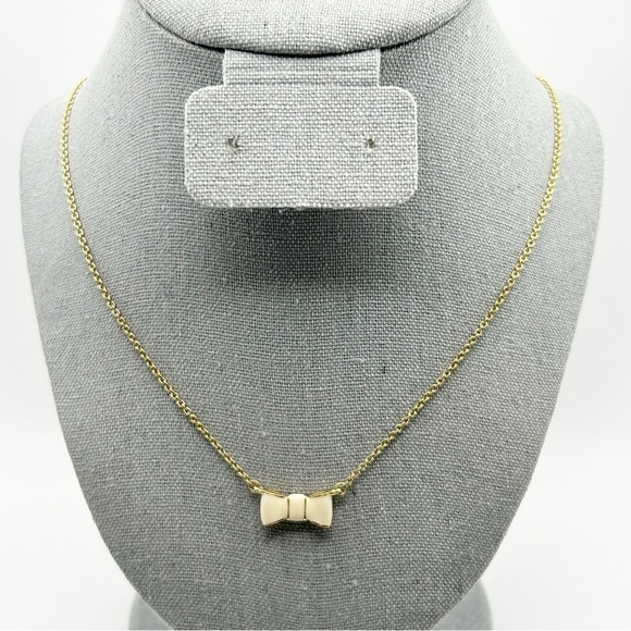 Kate Spade Gold Tone Chain with White Enamel Bow Ribbon Charm Short Necklace 19" - Picture 1 of 10
